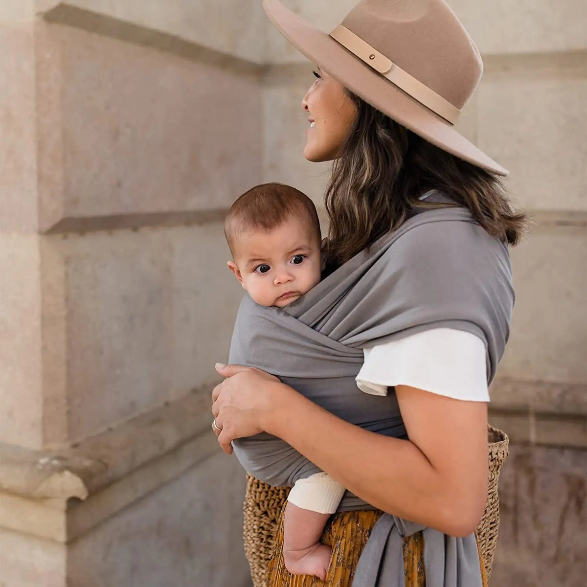 Baby wrap carrier tied around the body, hands free