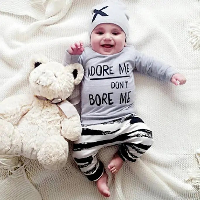 Three piece toddler clothing set with long sleeve top and trousers