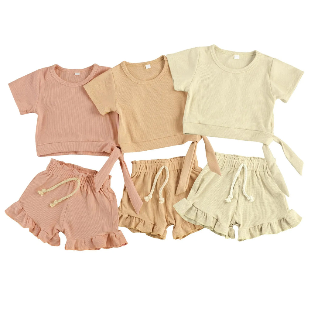 Baby girl summer set with cotton top and matching shorts in beige