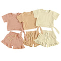 Baby girl summer set with cotton top and matching shorts in beige