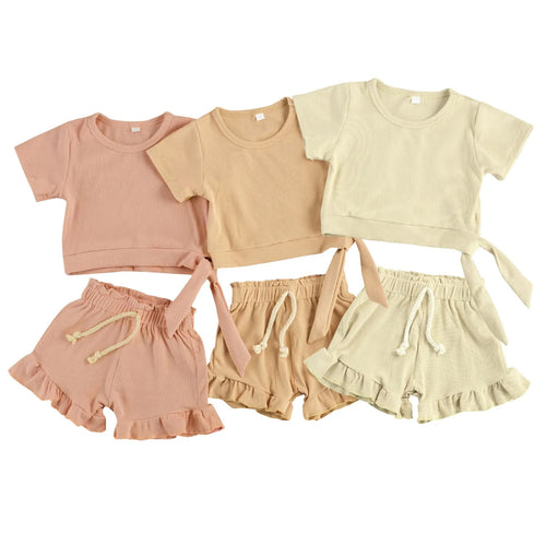 Baby girl summer set with cotton top and matching shorts in beige