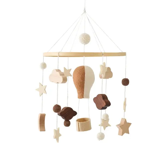 Musical crib mobile shown in an alternative colour