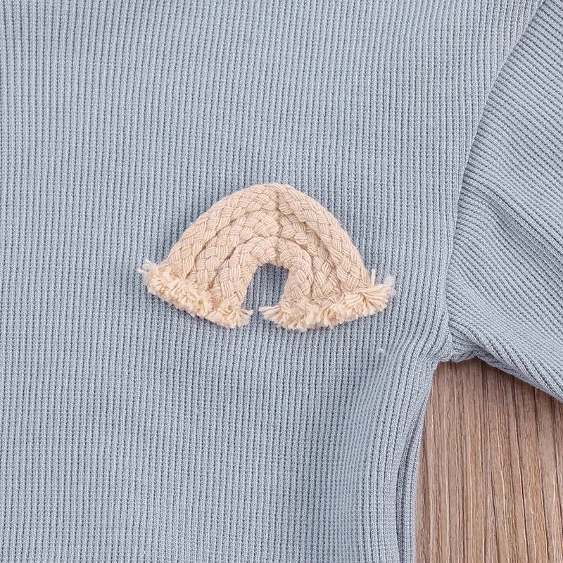 Rainbow embroidered baby set shown in an alternative colour