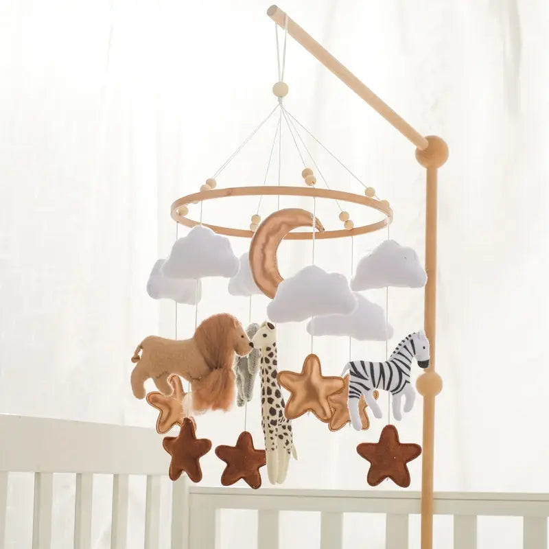 Musical crib mobile with hanging characters above a cot