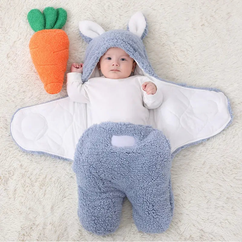 Baby sleeping bag with animal ear detailing on the hood