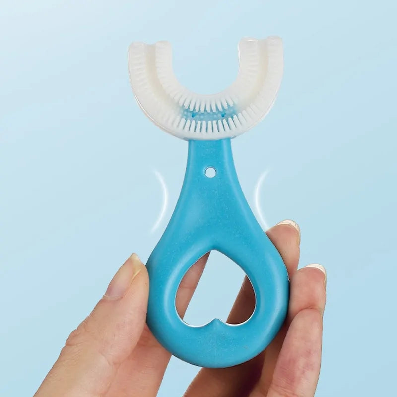 Silicone baby toothbrush with soft bristles
