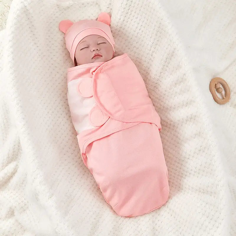 Cotton swaddle blanket unfolded showing the full print