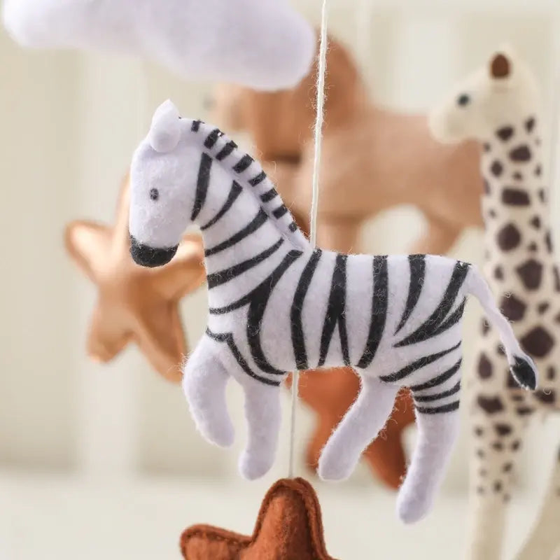 Musical crib mobile viewed from below as a baby would see it