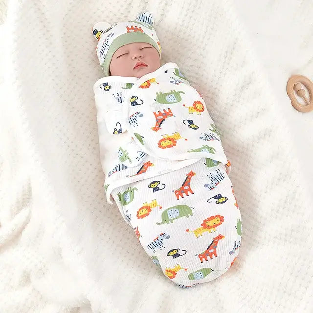 Cotton swaddle blanket and hat set shown folded