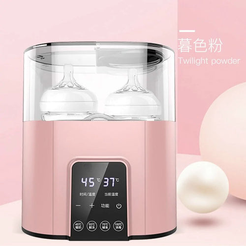 Baby bottle warmer with a bottle in place and the display lit